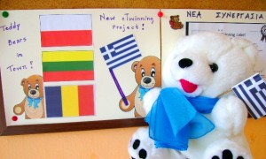 Greek teddy infront of the bulletin board