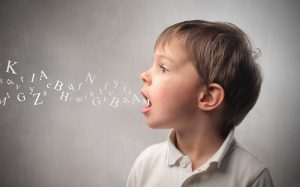 bigstock Child speaking and alphabet le 18001274 1200x747 c