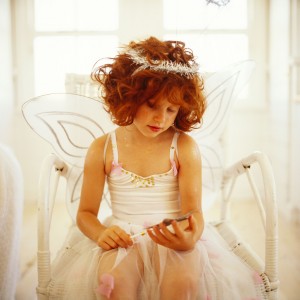 Young Girl (8-10) Dressed in a Fairy Costume --- Image by © Royalty-Free/Corbis