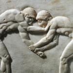 UNSPECIFIED - CIRCA 1900:  Greek civilization, 6th century b.C. Plinth of kouros statue depicting wrestlers, 510 b.C. Detail. Relief from the Kerameikos necropolis in Athens, Greece.  (Photo By DEA / G. NIMATALLAH/De Agostini/Getty Images)