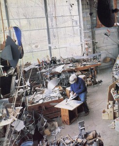 Alexander Calder in his studio