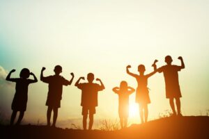 children s silhouettes showing muscles sunset 2048x1365 1