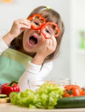 little-girl-playing-veggies