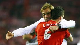 liverpool-manager-jurgen-klopp-celebrates-with-dejan-lovren-after-victory