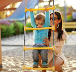 6125652 cute little child playing with his mother on the playground outdoor