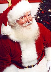 Jonathan G Meath portrays Santa Claus