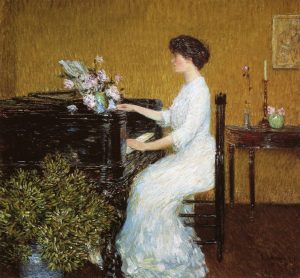 Childe Hassam at the piano